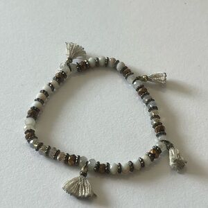 Elegant Beaded Bracelet with Tassels